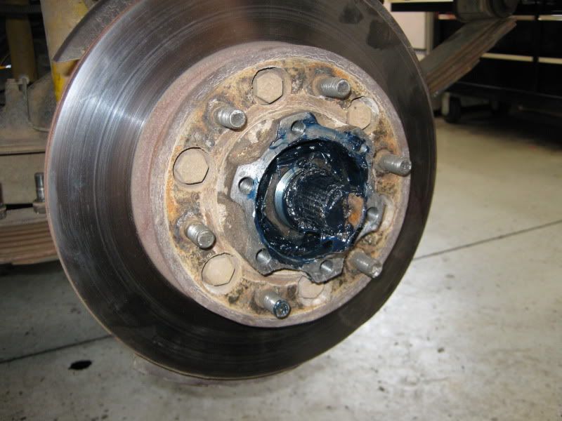 How to tighten nissan patrol wheel bearings